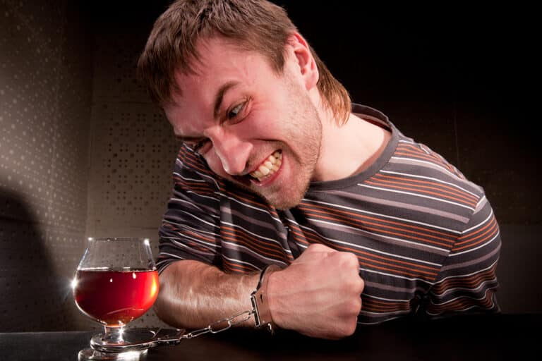 A man is struggling to stop his alcohol addiction