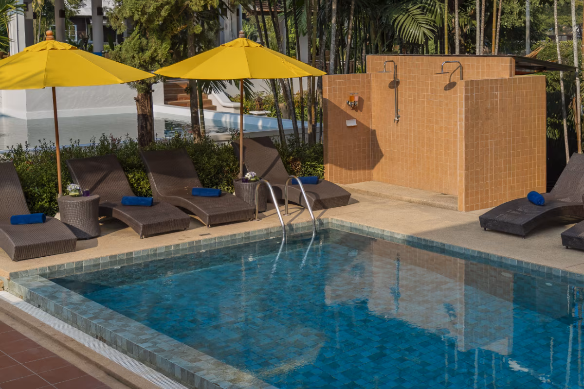 pool shower yellow umbrellas - PTSD & Trauma Treatment