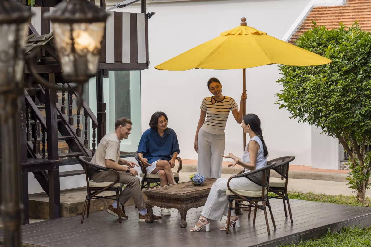 yellow umbrella 4 people cafe - PTSD & Trauma Treatment